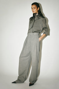 Three-quarter view CAMILLA AND MARC Ren Pant in Charcoal Herringbone styled with the Mina Short Sleeve Shirt.