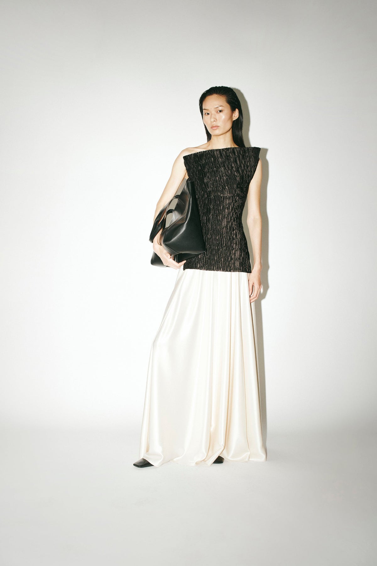 Styled view CAMILLA AND MARC Elise Top in Black with the Arion Skirt in Cream.