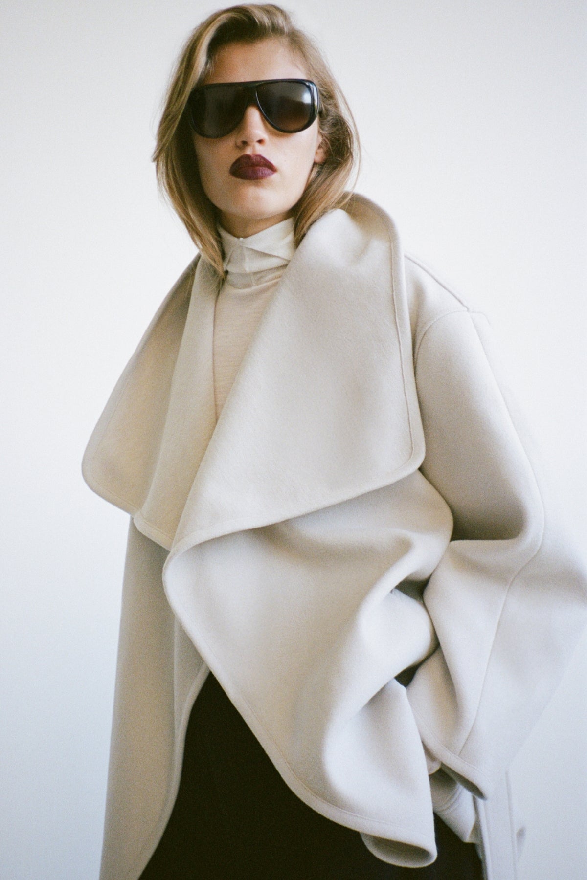 Styled view CAMILLA AND MARC Audrey Wrap Jacket in oat with relaxed belted silhouette.