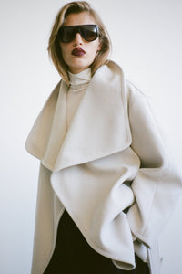 Styled view CAMILLA AND MARC Audrey Wrap Jacket in oat with relaxed belted silhouette.
