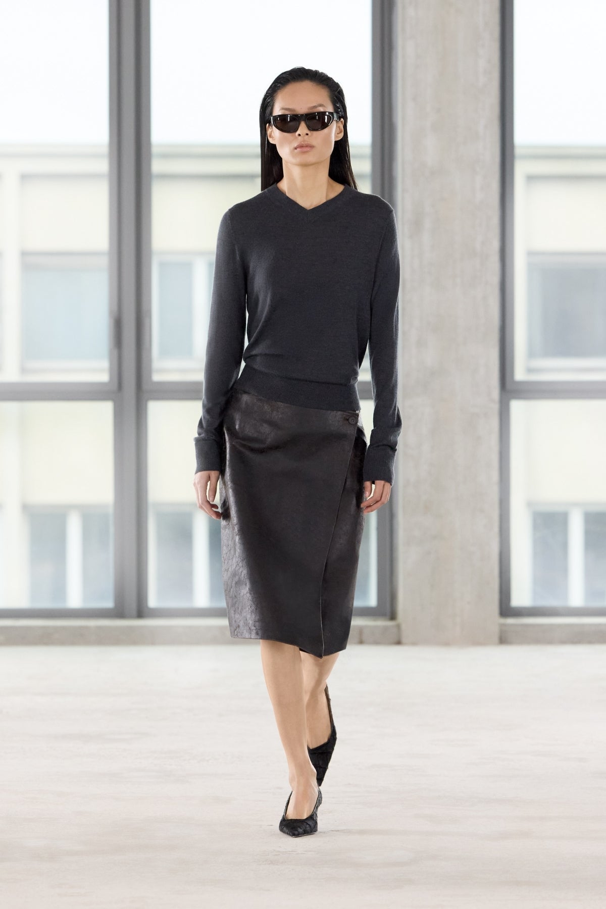 Runway view CAMILLA AND MARC Leona Knit V Neck Sweater in Charcoal with long sleeves and soft knit finish.