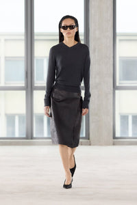 Runway view CAMILLA AND MARC Leona Knit V Neck Sweater in Charcoal with long sleeves and soft knit finish.