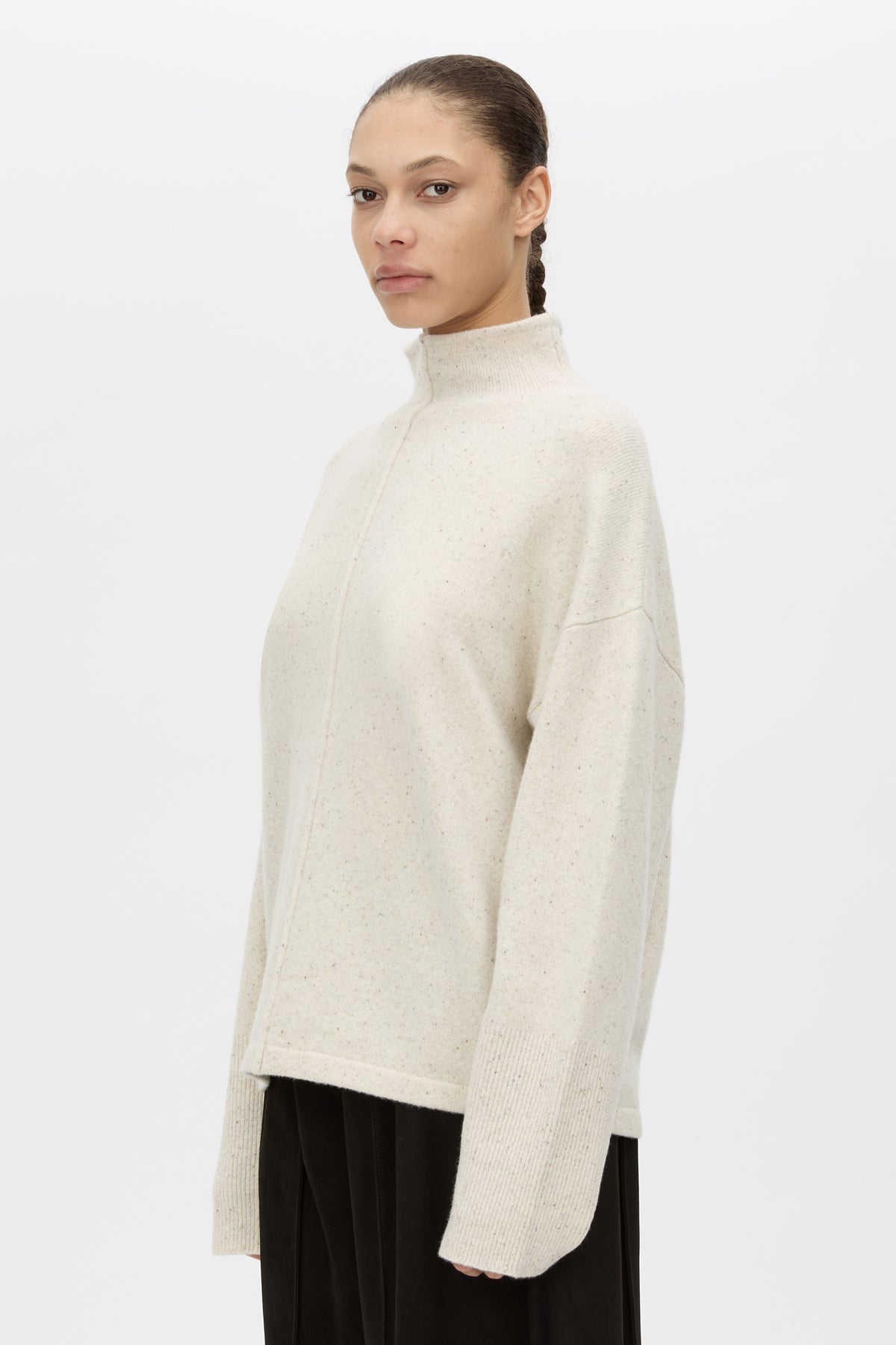 Close up View CAMILLA AND MARC Atkinson Knit Sweater in ashen white with fitted turtleneck and oversized fit.