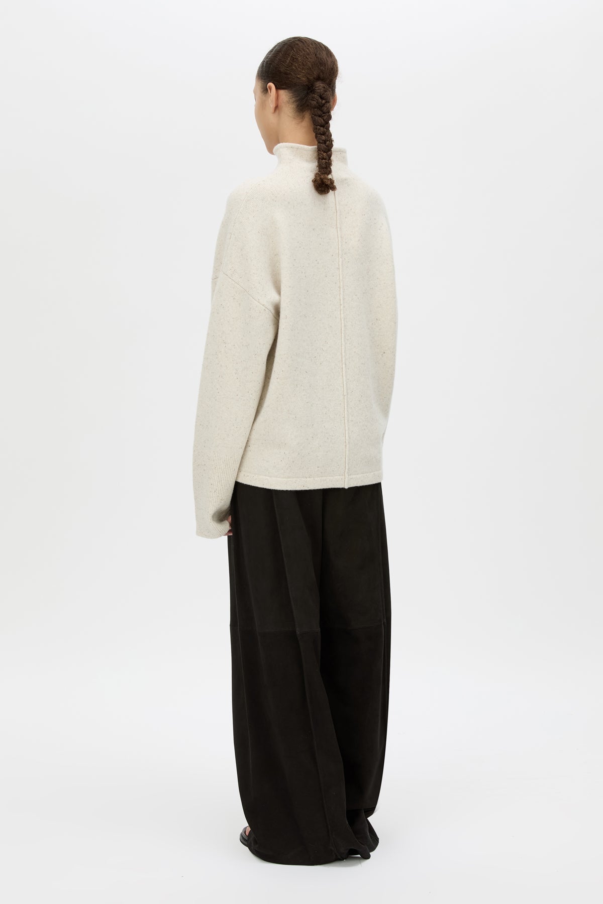 Back View CAMILLA AND MARC Atkinson Knit Sweater in ashen white with fitted turtleneck and oversized fit.