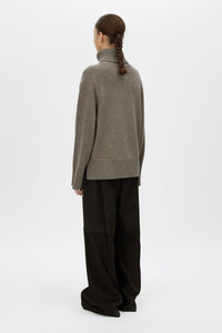 Back view CAMILLA AND MARC Crawford Knit Roll Neck Sweater in Grey with wool knit finish and roll‑neck silhouette.