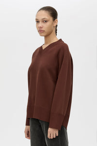 Close up View CAMILLA AND MARC Donatello Knit Sweater in espresso brown with V neck and knit fabric.