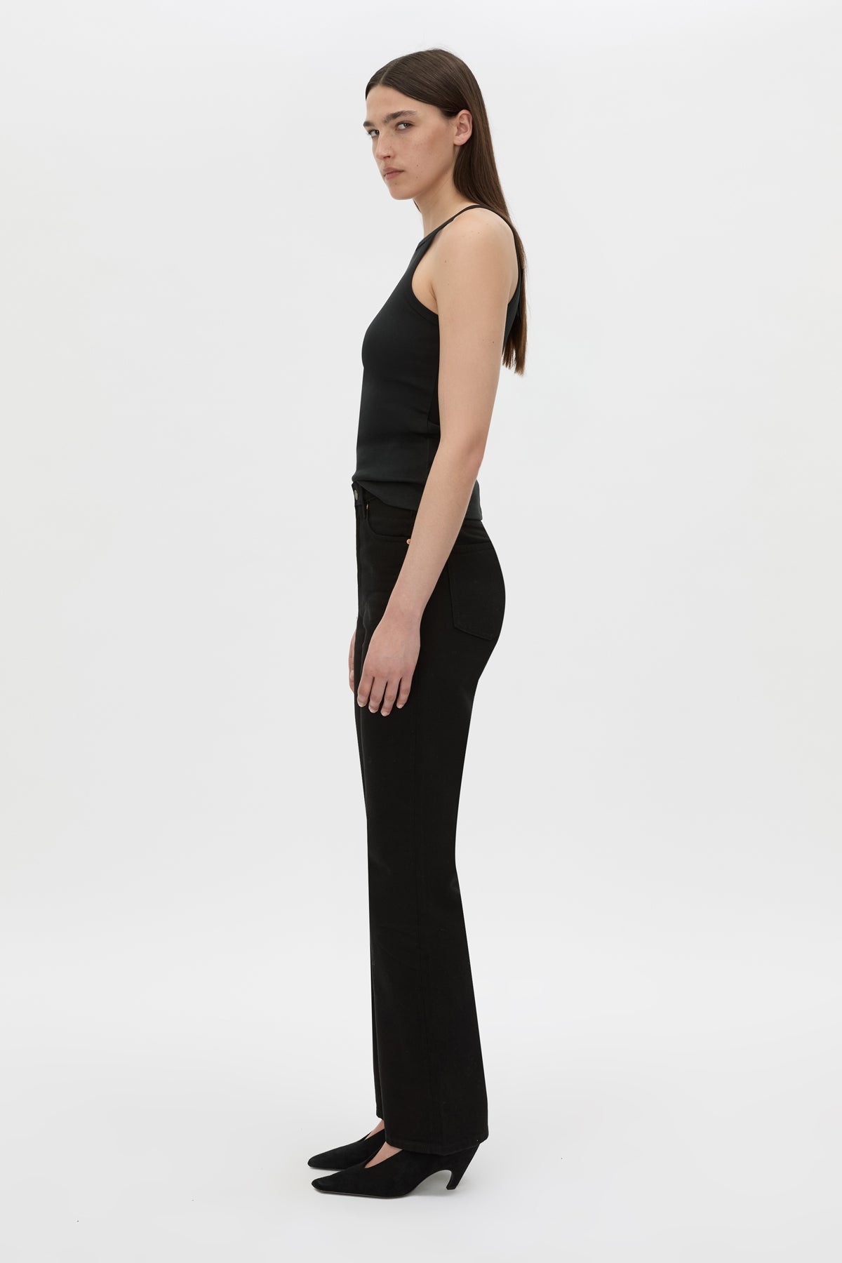 Side view CAMILLA AND MARC Alba high neck rib cotton blend fitted tank in black with spaghetti straps and rib binding at edges.