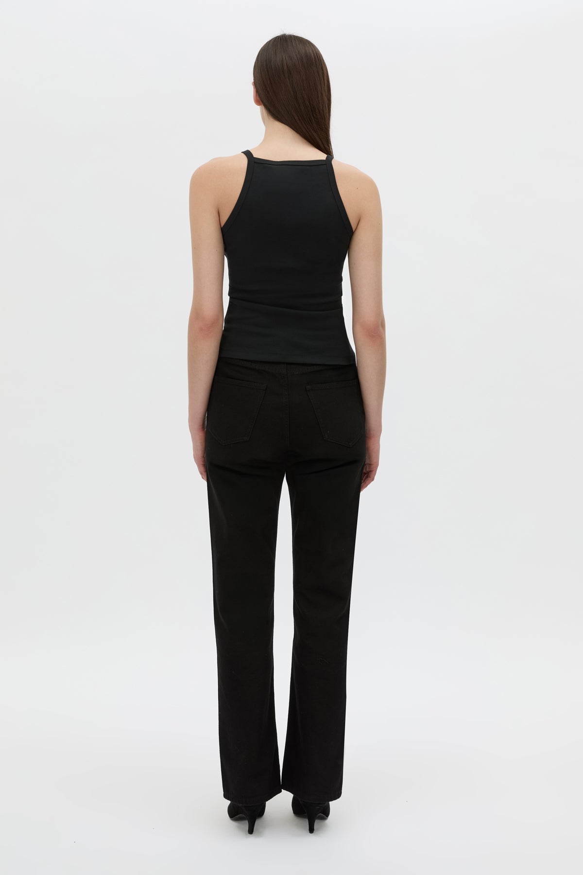 Back view CAMILLA AND MARC Alba high neck rib cotton blend fitted tank in black with spaghetti straps and rib binding at edges.