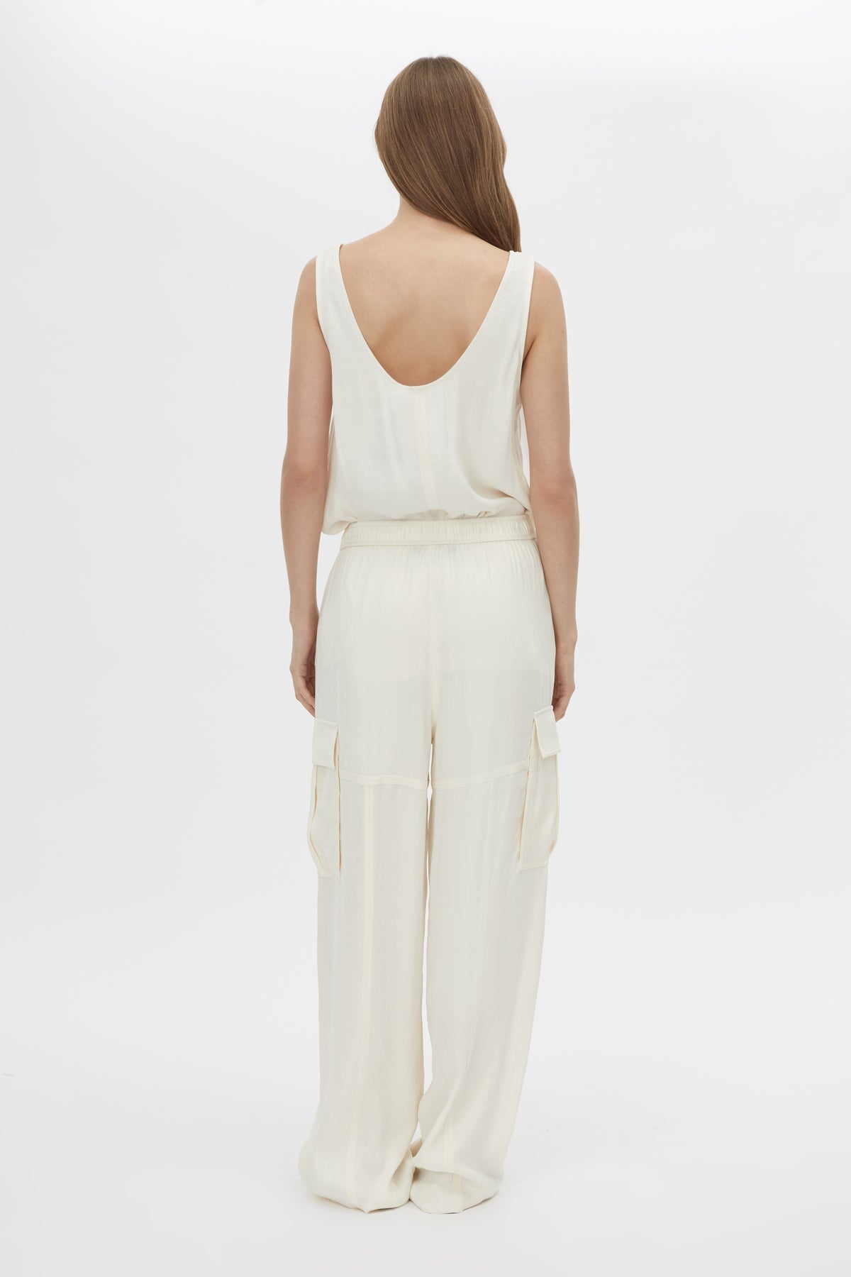 Back view CAMILLA AND MARC Allegro Satin Pant in Cream with mid‑rise cargo fit.