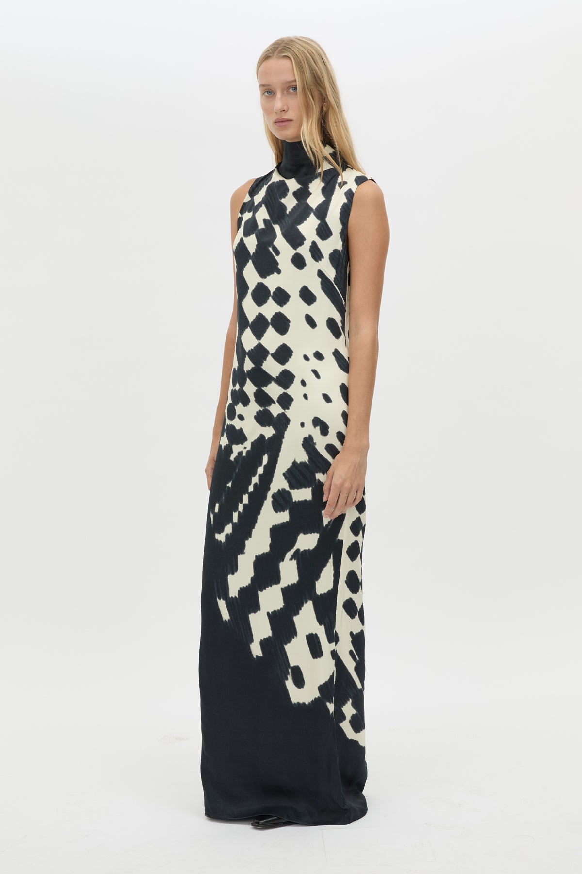 Three-quarter view CAMILLA AND MARC Asper Maxi Dress in Navy Print with a sleeveless column silhouette.