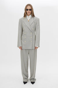 Front styled view CAMILLA AND MARC Aspira Blazer in Dusty Blue with a draped double‑breasted wool silhouette.