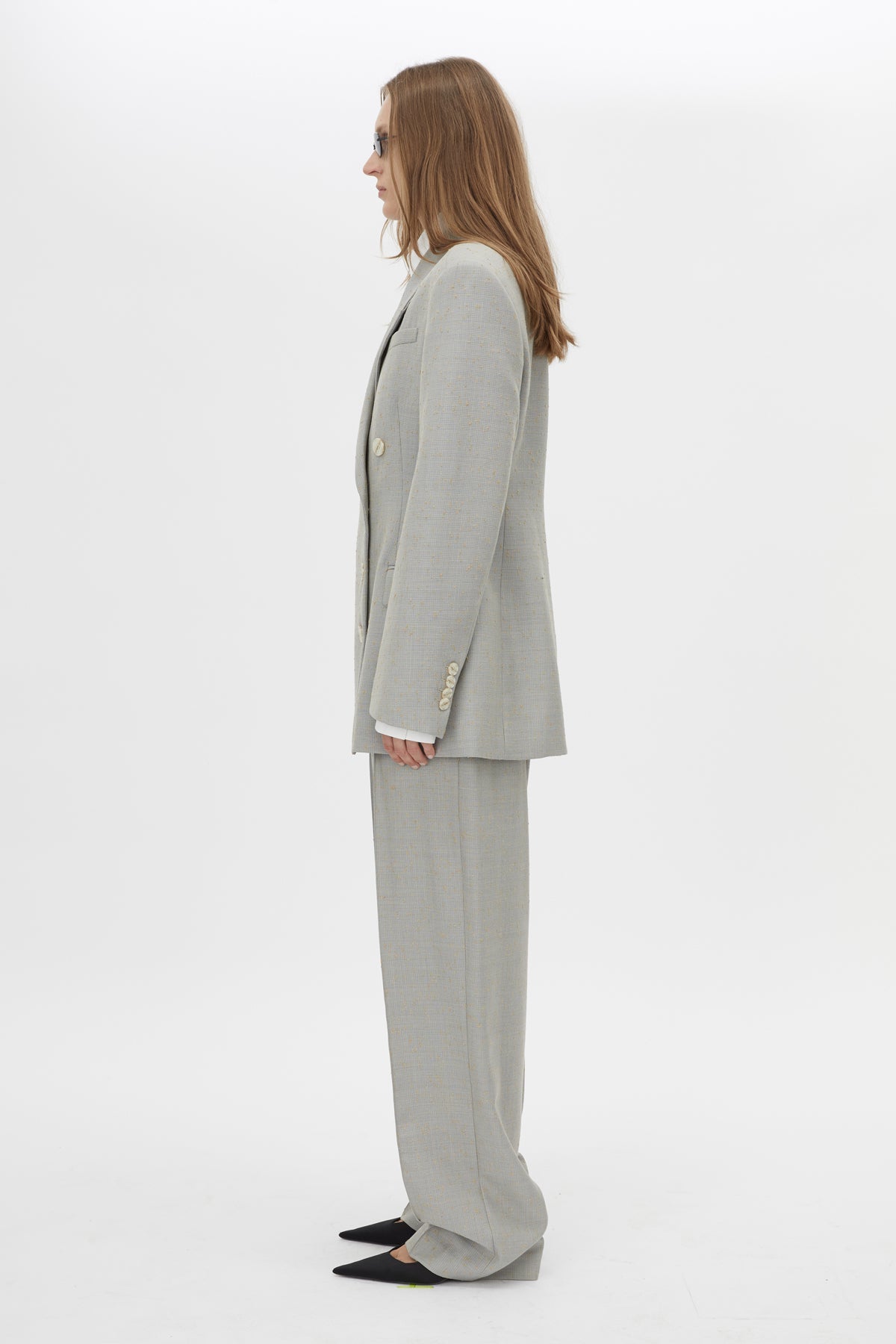 Side view CAMILLA AND MARC Aspira Blazer in Dusty Blue with a draped double‑breasted wool silhouette.