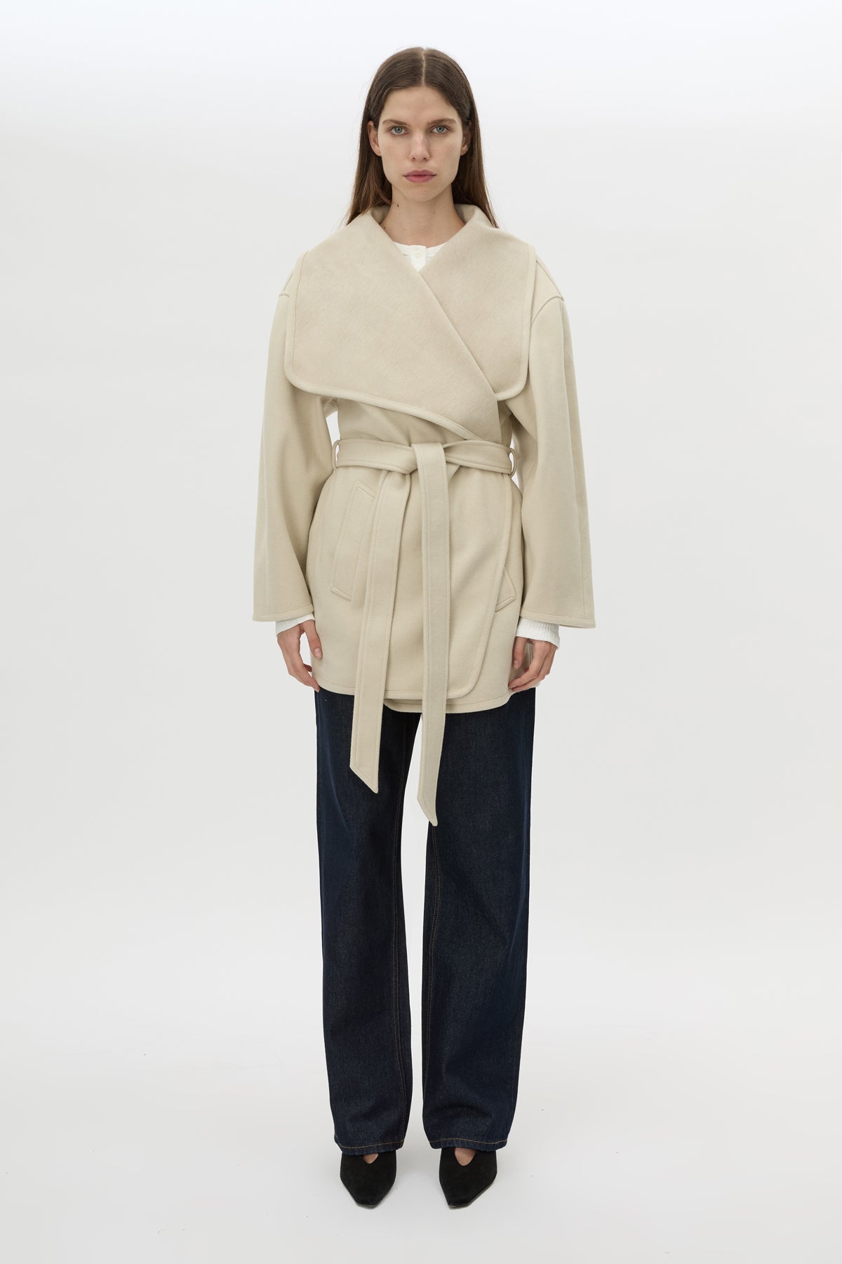 Front styled view CAMILLA AND MARC Audrey Wrap Jacket in oat with relaxed belted silhouette.