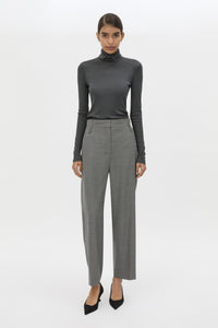 Front view CAMILLA AND MARC Barre High Neck Top in Charcoal Grey with long sleeves and V‑neck split turtleneck.