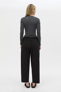 Back view CAMILLA AND MARC Beau Tapered Crop Pant in Black with elasticated waistband.