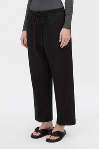 Cropped view CAMILLA AND MARC Beau Tapered Crop Pant in Black with elasticated waistband.