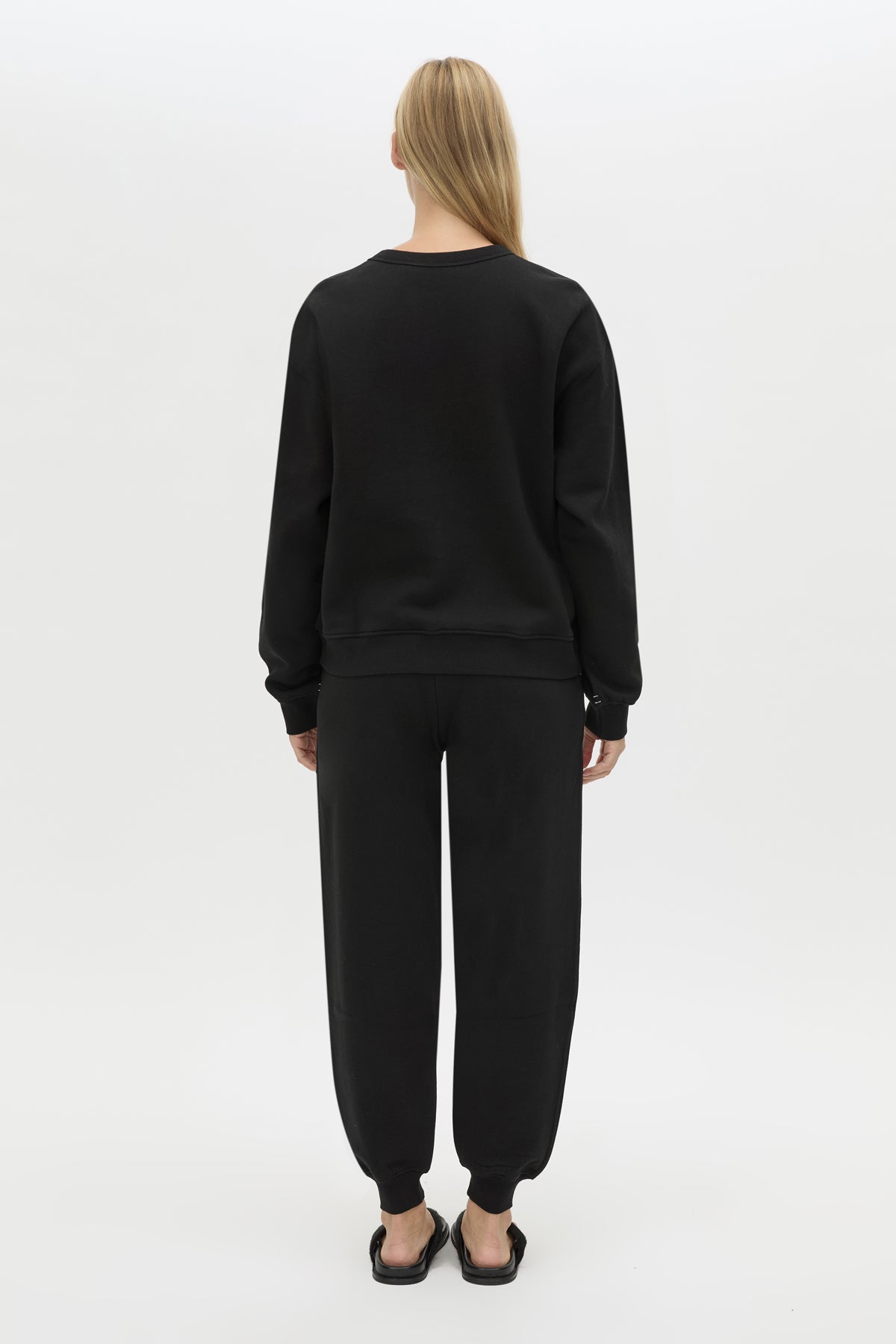 Back view CAMILLA AND MARC Bonnie Small Graphic Sweater in Black with relaxed fit and circle flocked artwork. 