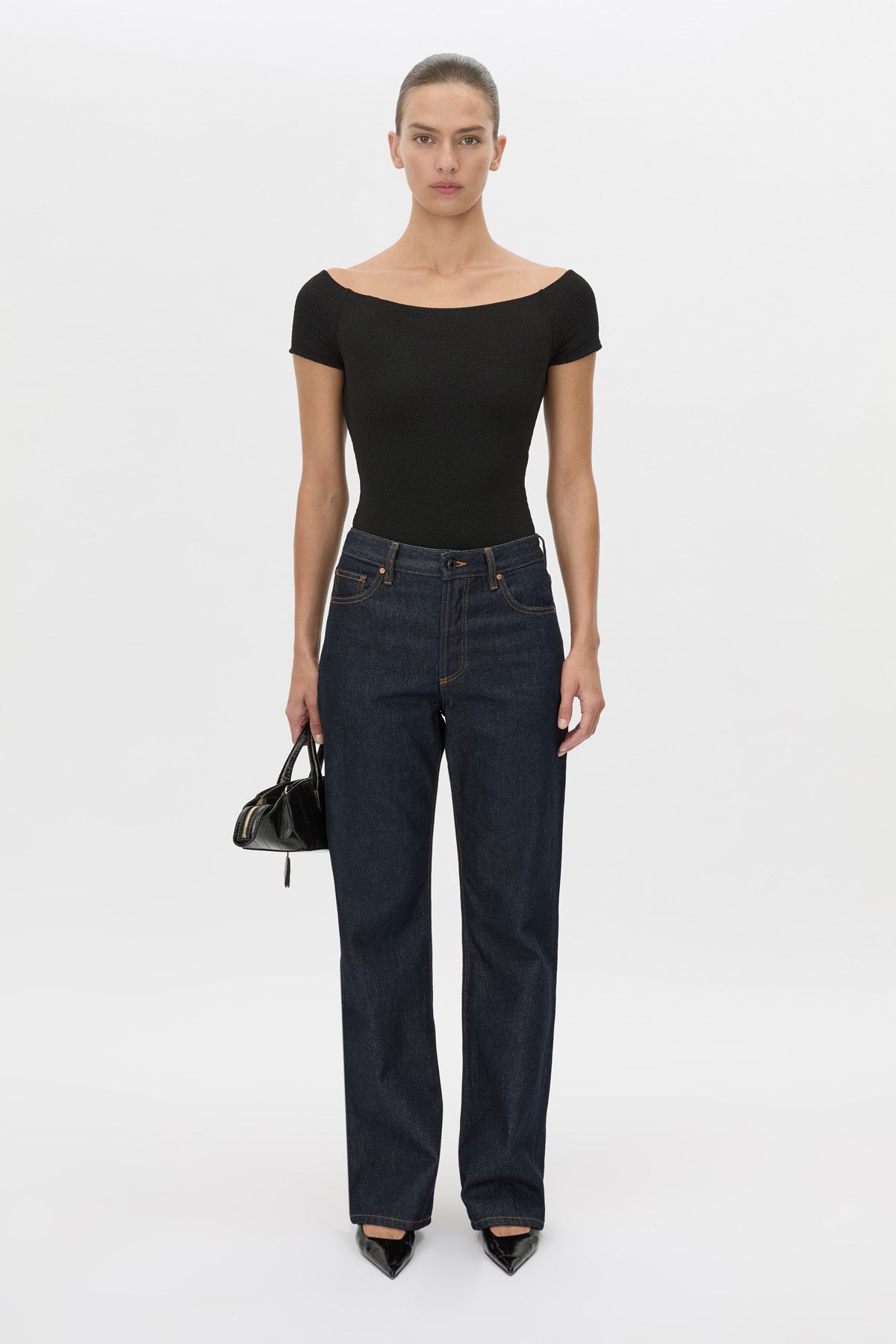 Front view CAMILLA AND MARC Cali Off The Shoulder Bodysuit in black.