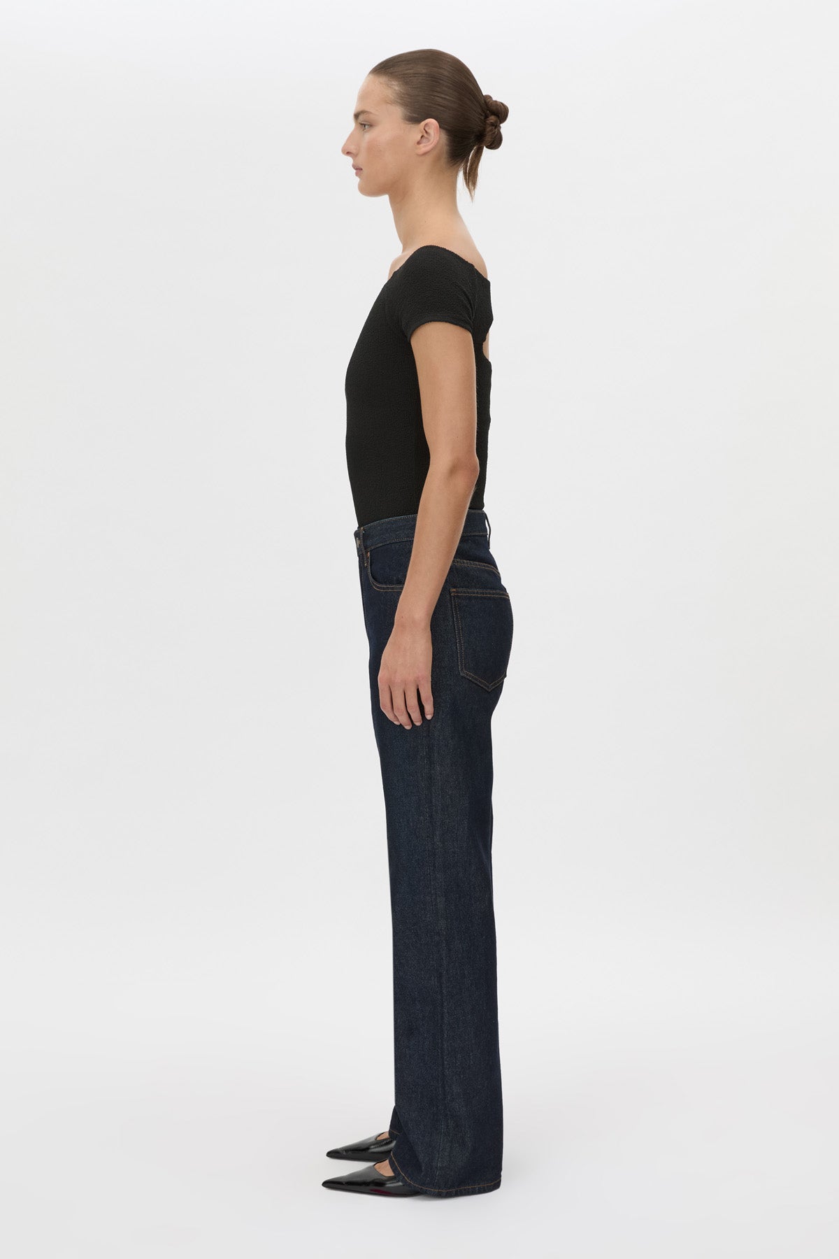Side view CAMILLA AND MARC Cali Off The Shoulder Bodysuit in black.