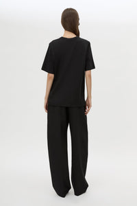 Back view CAMILLA AND MARC Carmont Graphic Tee in Black with white graphic logo.