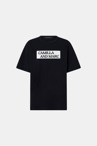 Ghost view CAMILLA AND MARC Carmont Graphic Tee in Black with white graphic logo.