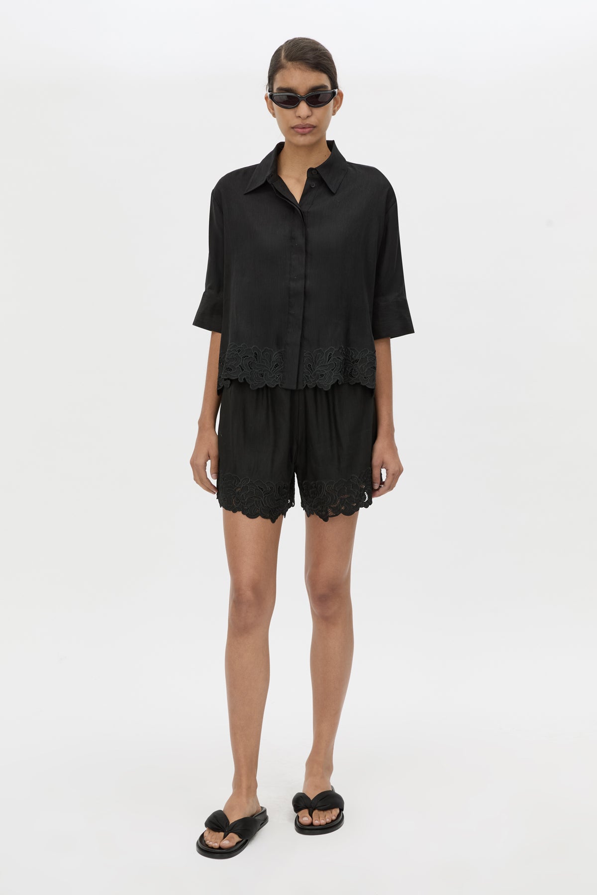 Front view CAMILLA AND MARC Chara Embroidered Short in Black with embroidered hem and elasticated waistband.
