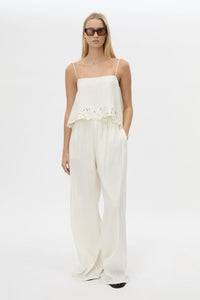 Front styled view CAMILLA AND MARC Chara Relaxed Pant in Cream with elastic waist, and back welts.