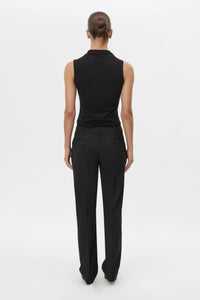 Back view CAMILLA AND MARC Chiaro Slim-Fit Pant in black with low‑waisted, tailored waistband.