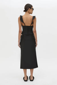 Back view CAMILLA AND MARC Chiaro Midi Skirt in black with low‑rise fit.