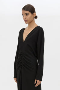 Cropped view CAMILLA AND MARC Dune Draped Waist Midi Dress in Black with gathered waist detailing.