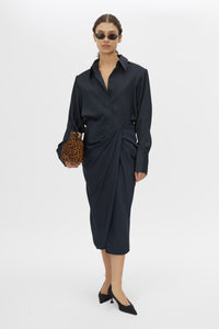 Front view CAMILLA AND MARC Elowyn Wrapped Midi Skirt in French Navy with front draped detailing.