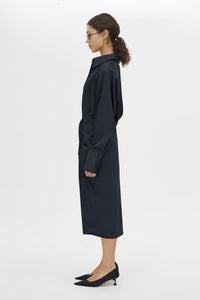 Side view CAMILLA AND MARC Elowyn Wrapped Midi Skirt in French Navy with front draped detailing.