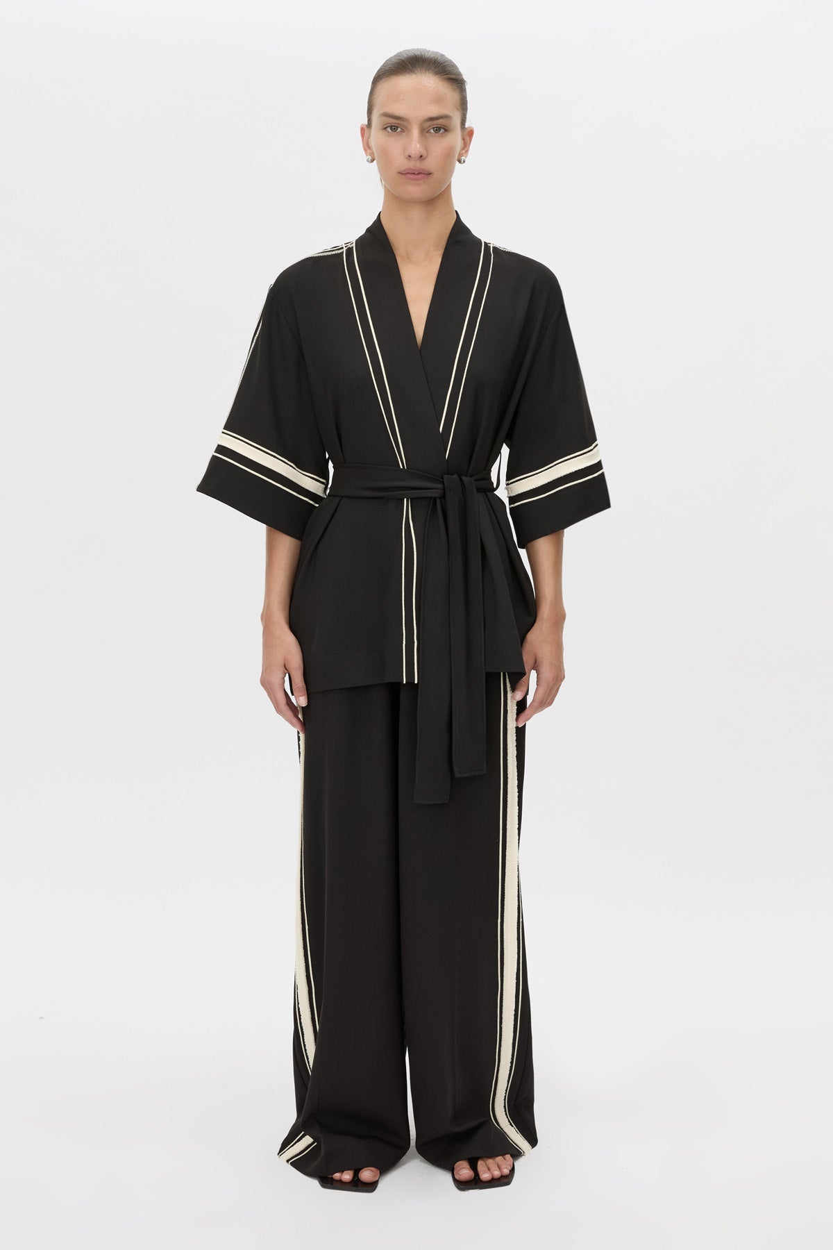 Front view CAMILLA AND MARC relaxed Enna Robe in black with embroidery detail.