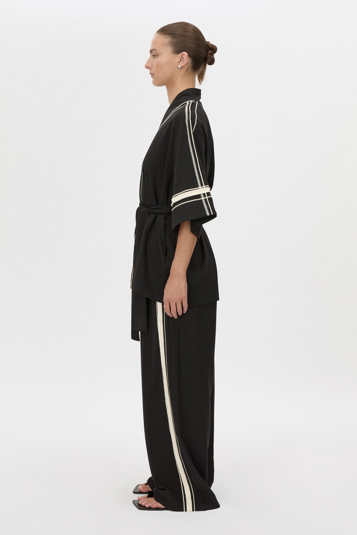 Side view CAMILLA AND MARC relaxed Enna Robe in black with embroidery detail.