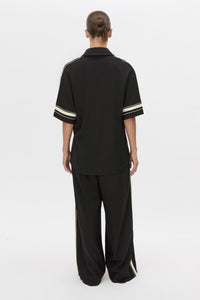Back view CAMILLA AND MARC relaxed Enna Shirt in black with embroidery detail.