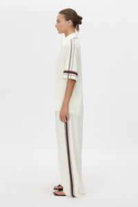 Side view CAMILLA AND MARC relaxed Enna Shirt in stone with embroidery detail.