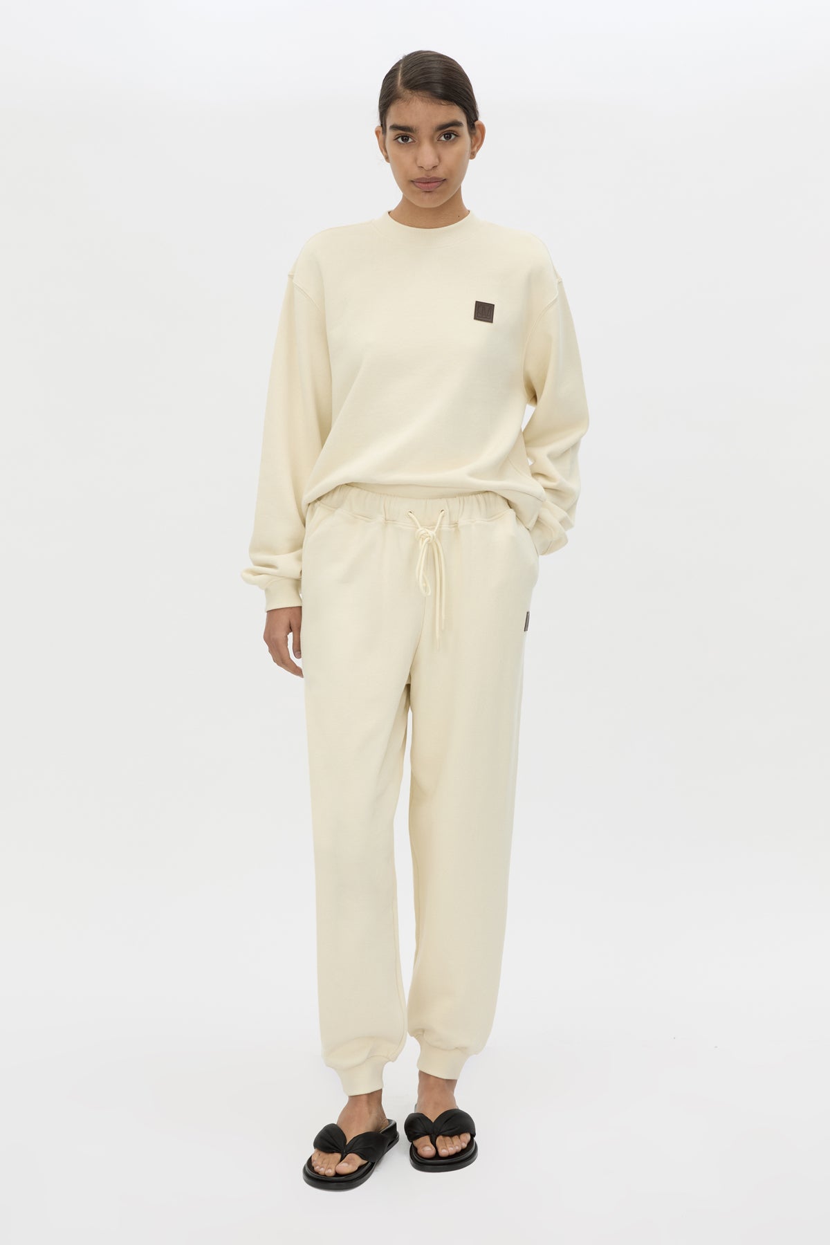 Front view CAMILLA AND MARC Idris Tracksuit Top in Ecru with folded rib crew neckline.