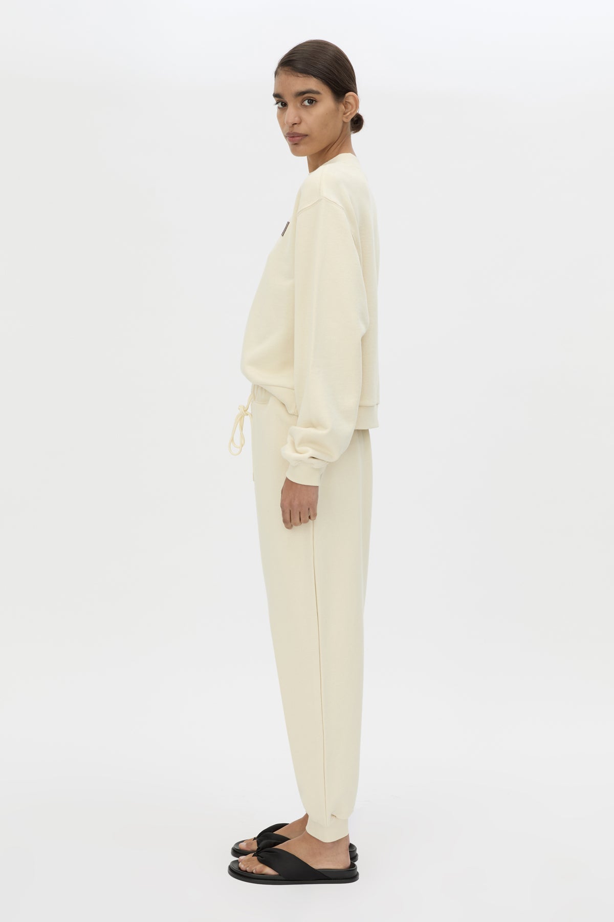 Side view CAMILLA AND MARC Idris Tracksuit Top in Ecru with folded rib crew neckline.