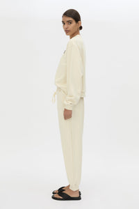 Side view CAMILLA AND MARC Idris Tracksuit Top in Ecru with folded rib crew neckline.