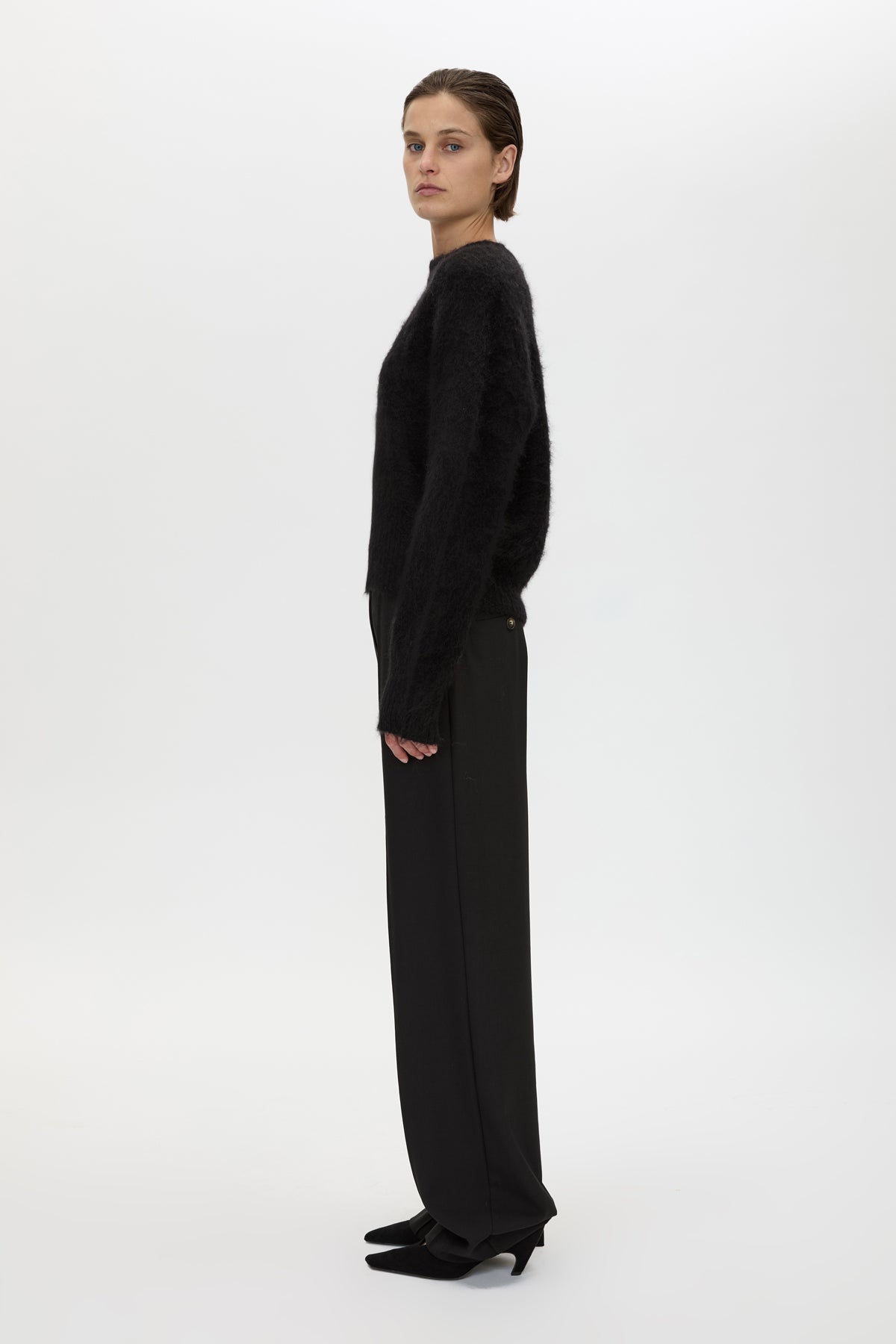 Side view CAMILLA AND MARC Ines Knit Sweater in Black with brushed knit texture and ribbed crew neckline.