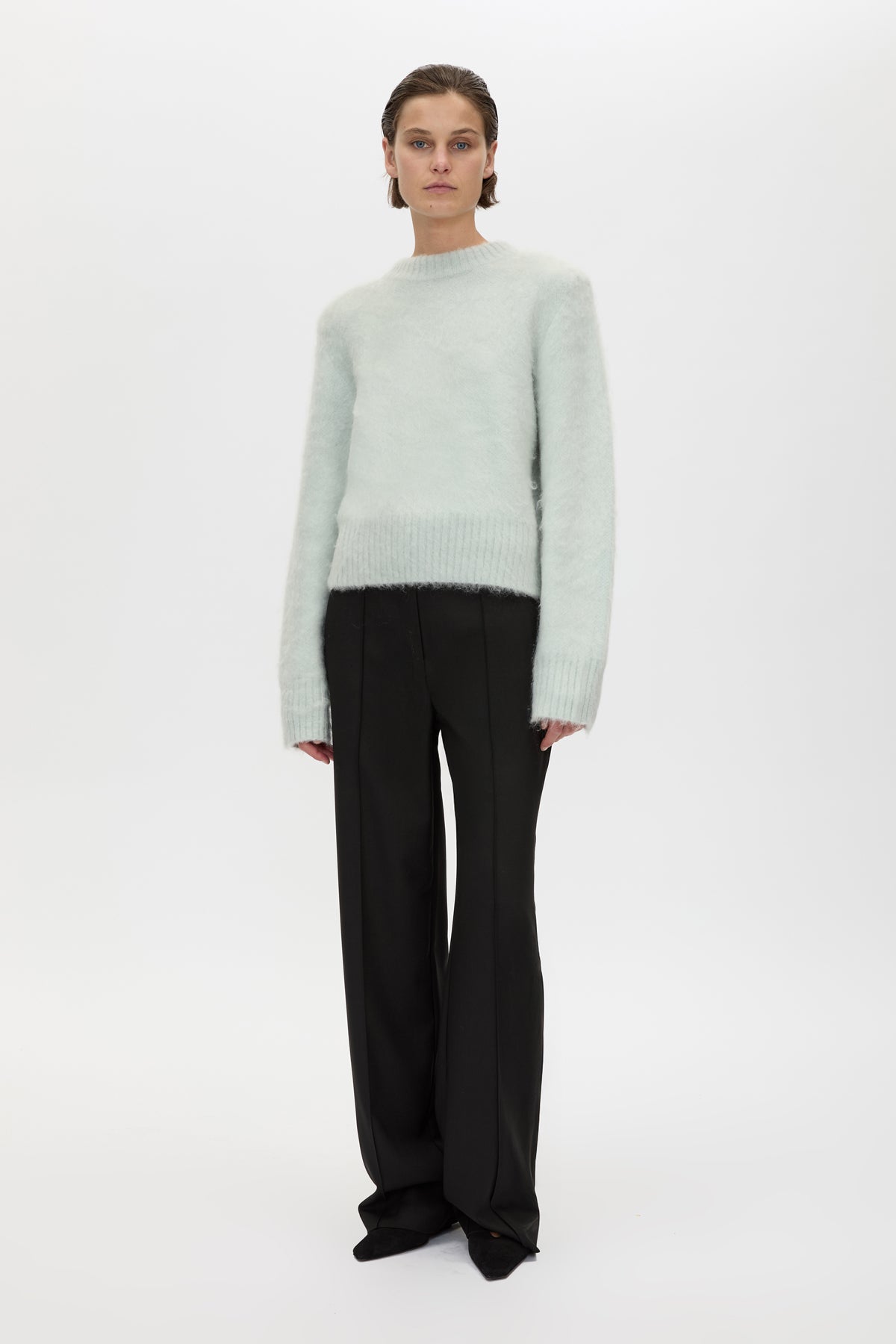 Front styled view CAMILLA AND MARC Ines Knit Sweater in Mint with brushed knit texture and ribbed crew neckline.