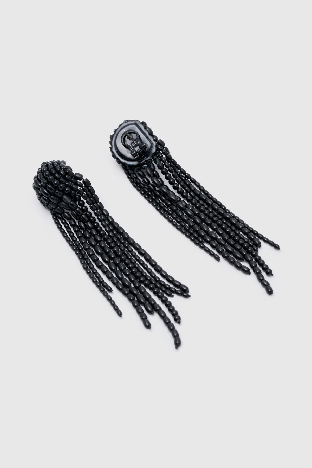 Ghost view CAMILLA AND MARC Irida Drop Earrings in black with glossy beaded drop design.