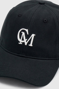 Cropped view CAMILLA AND MARC Isolde Embroidered Logo Cap in Black and White with front embroidered artwork.