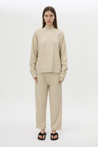 Front view CAMILLA AND MARC Lloyd Cropped Track Pant in cream with a straight leg and elasticated waist.