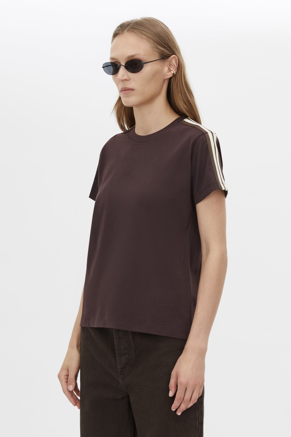Cropped view CAMILLA AND MARC Locus Tee in Espresso with fitted baby‑tee silhouette and contrast stripe tape.  