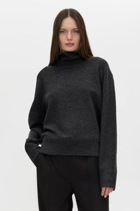 Cropped view CAMILLA AND MARC Margot Turtleneck Knit Sweater in Charcoal Grey with ribbed collar and hems.