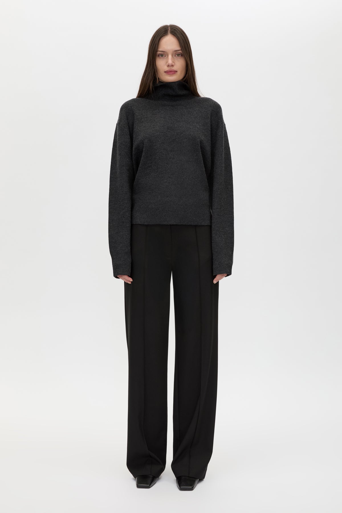 Front styled view CAMILLA AND MARC Margot Turtleneck Knit Sweater in Charcoal Grey with ribbed collar and hems.