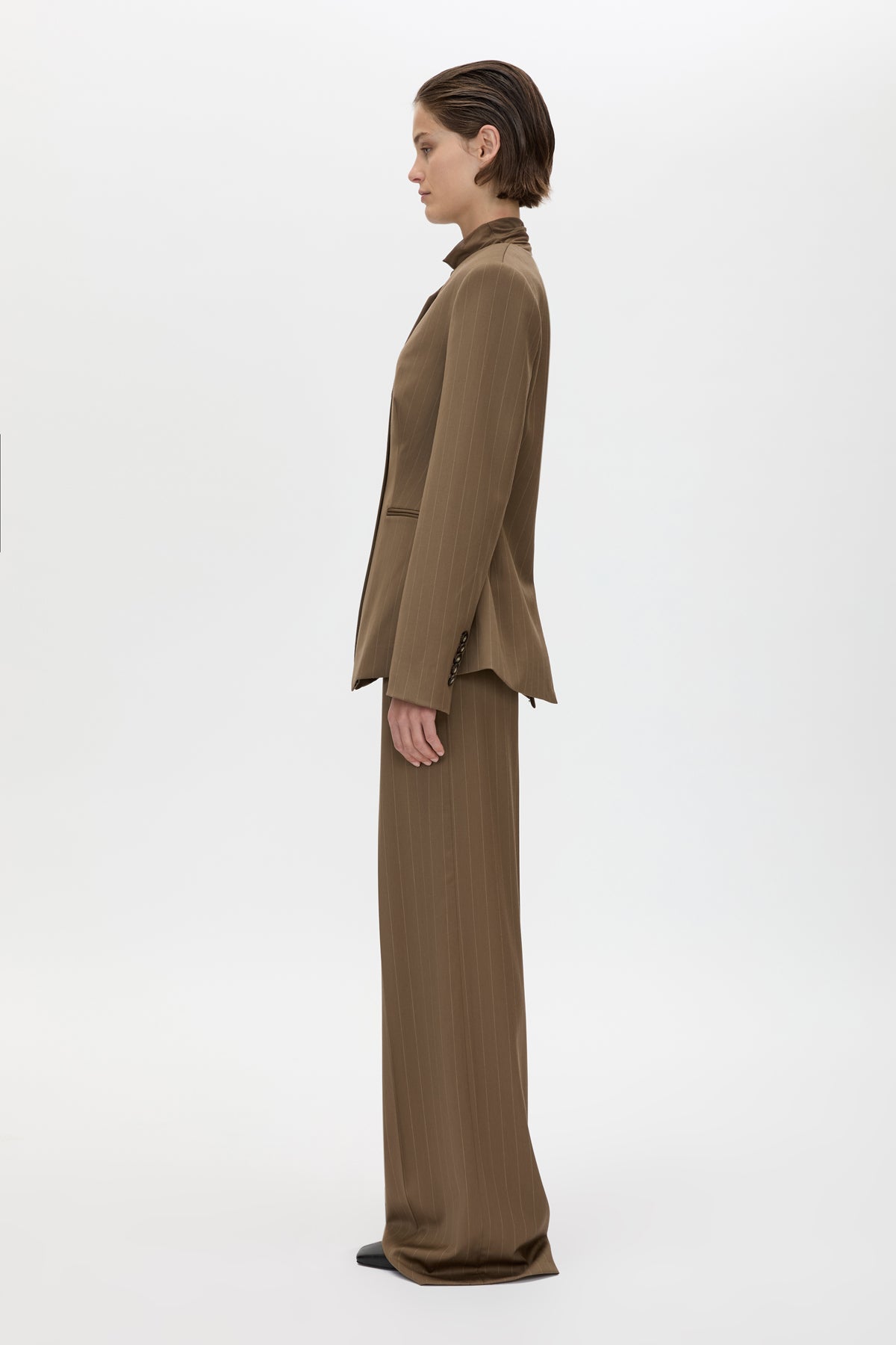 Side view CAMILLA AND MARC Maxim Fitted Collarless Blazer in Cinnamon Pinstripe with wool blend fabrication.