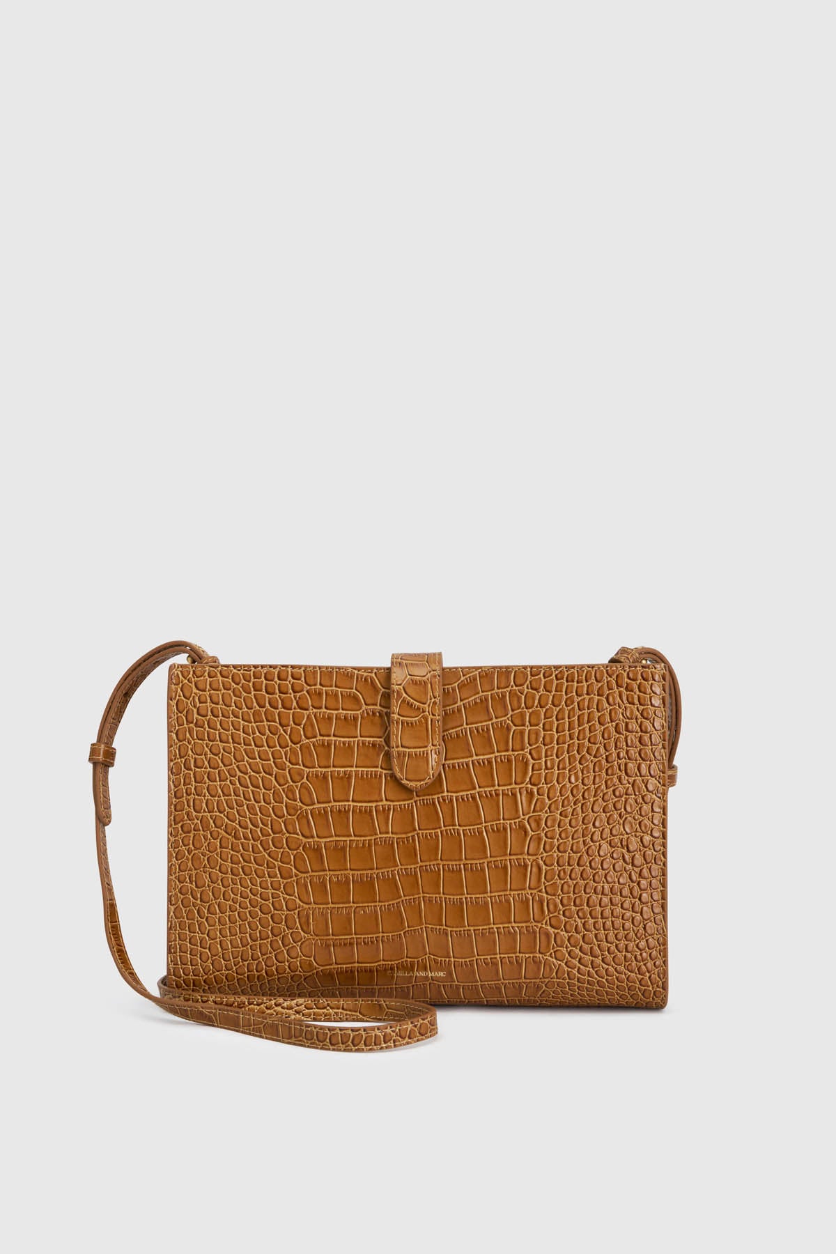 Ghost view CAMILLA AND MARC Mette Croc Clutch in tan croc‑embossed leather.