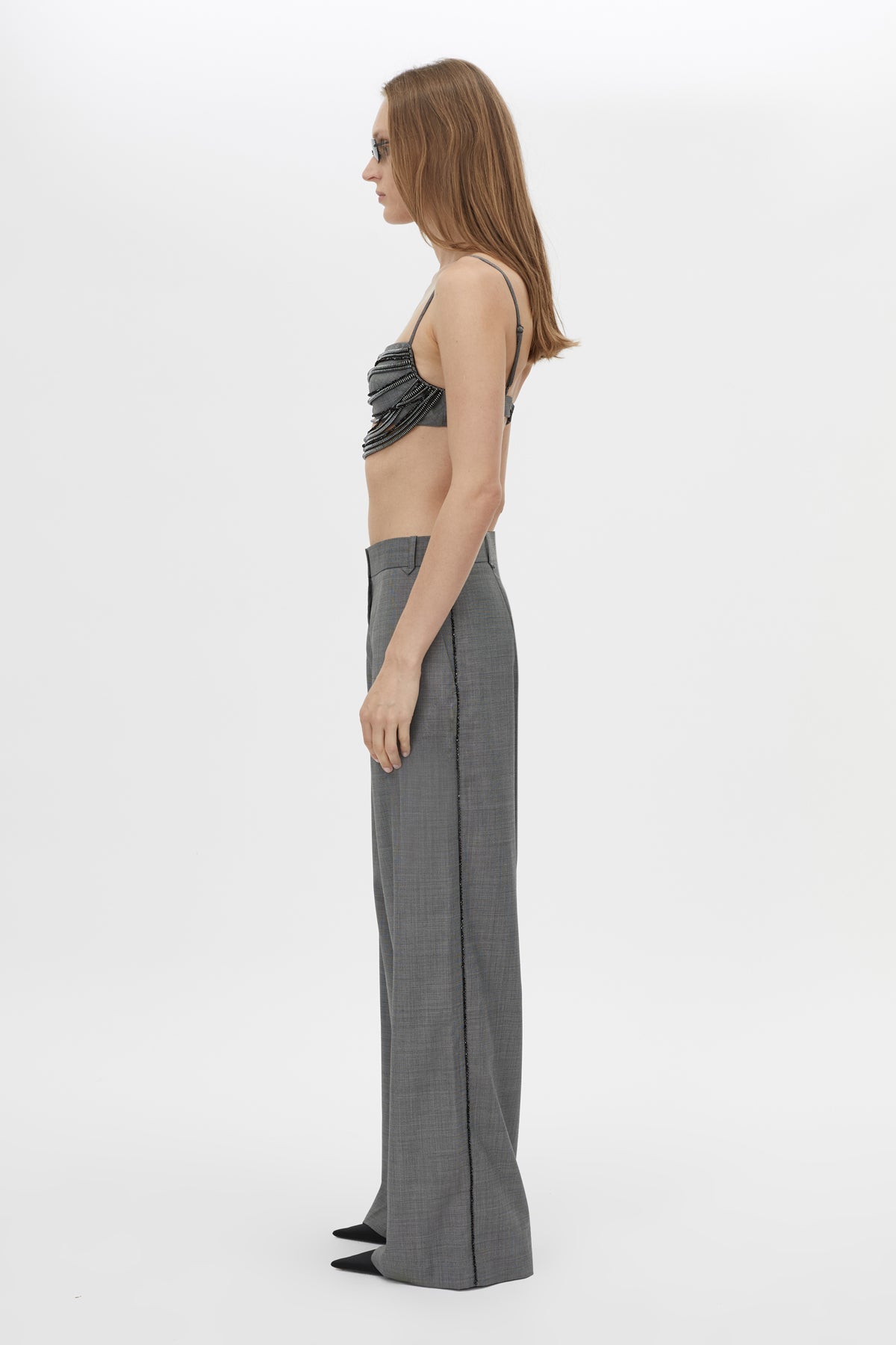 Side view CAMILLA AND MARC Meyer Beaded Pant in Charcoal Grey with a low‑rise tailored silhouette and beaded side seams.